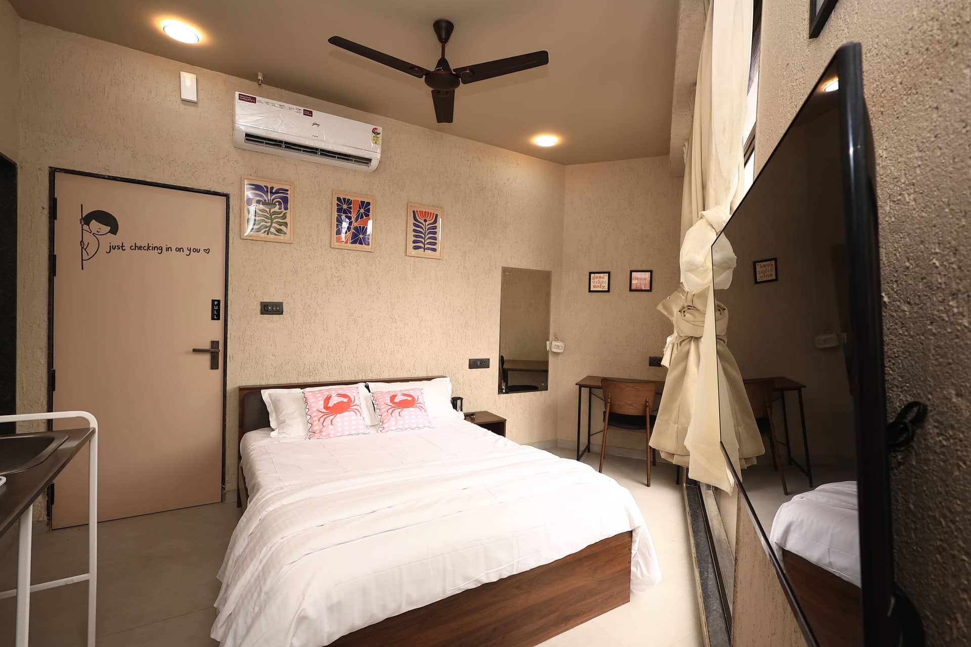 Mikami interior with gallery wall and ceiling fan